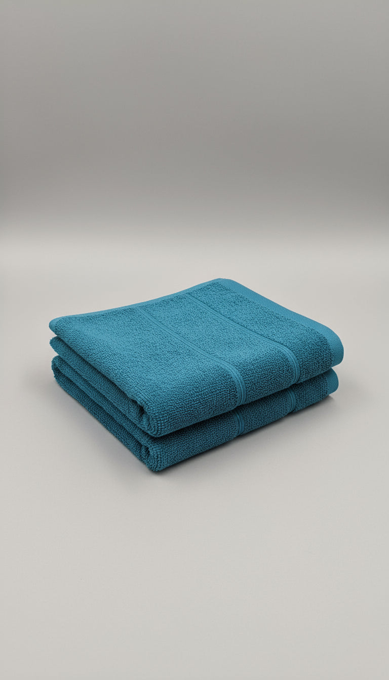 Close-up of a blue towel with a dark background