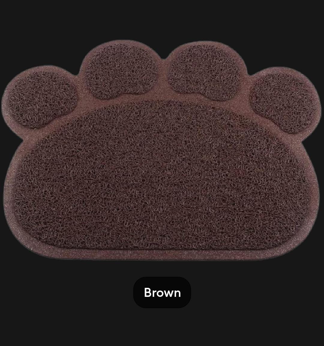 Brown paw-shaped doormat on a black background