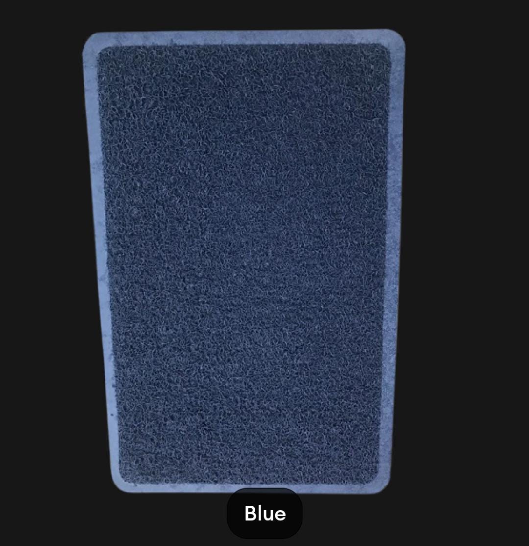 Blue rectangular mat with textured surface on a black background
