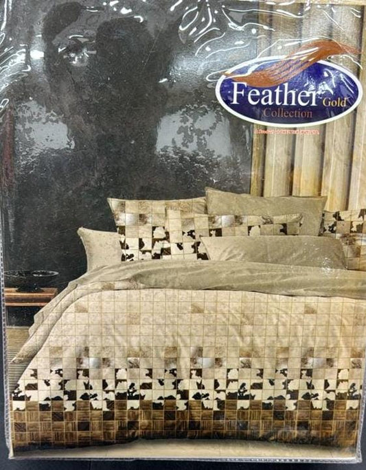 Bedding set packaging with 'Feather Gold' logo on a reflective surface