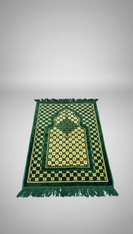 Green and yellow patterned prayer mat with geometric design